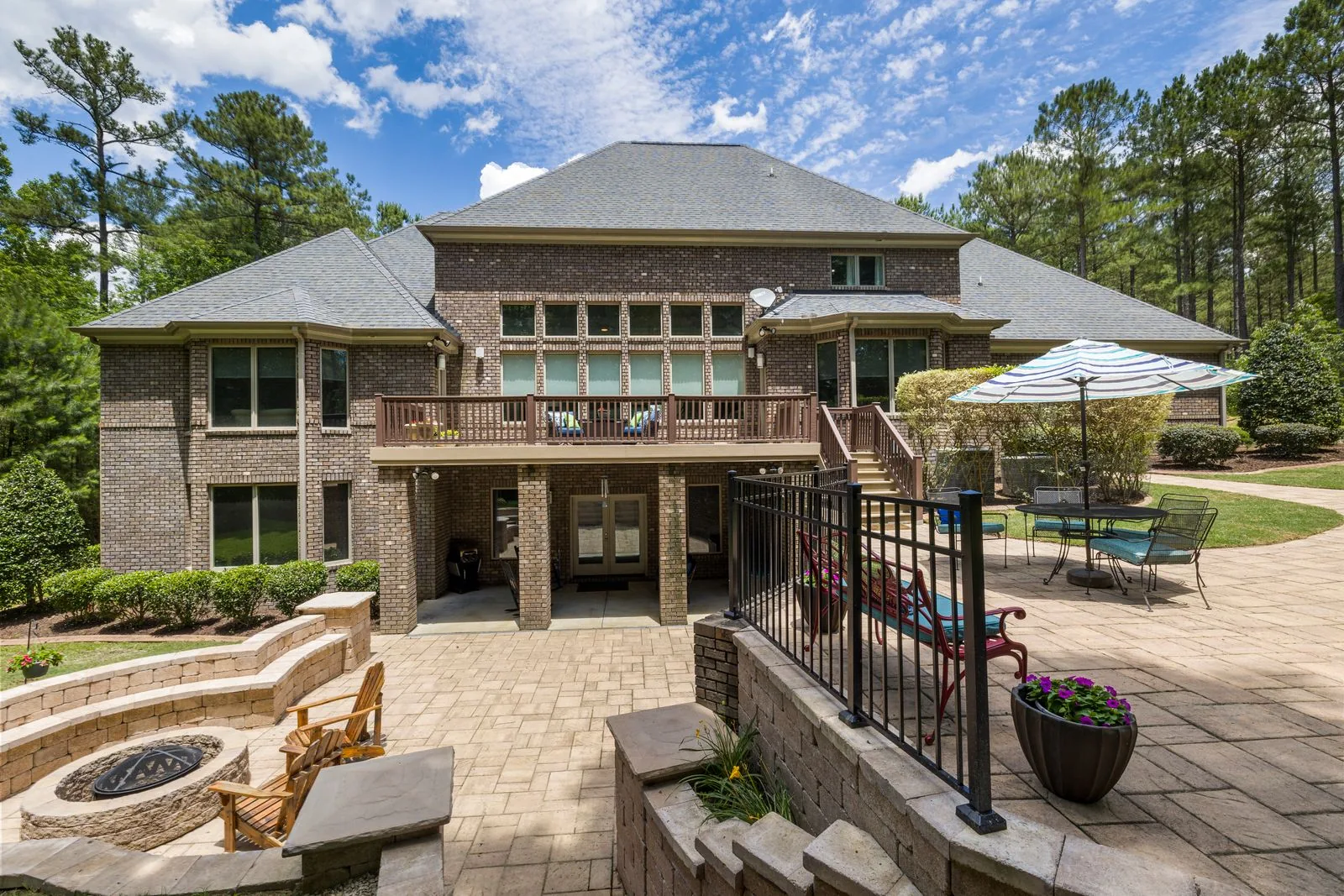 Landscaped backyard with a patio by a Bellevue-area remodeler