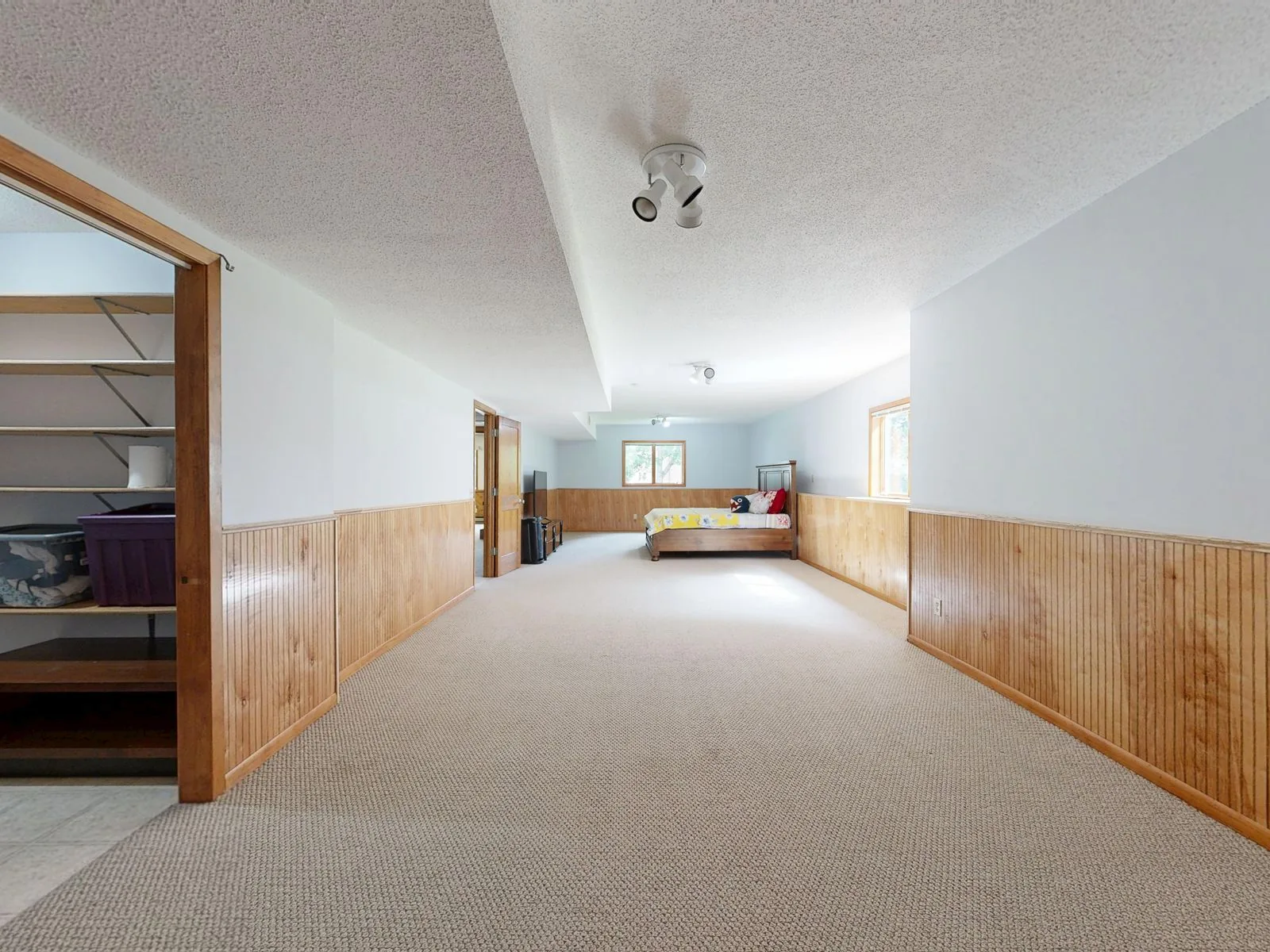 Finished basement living space with premium materials