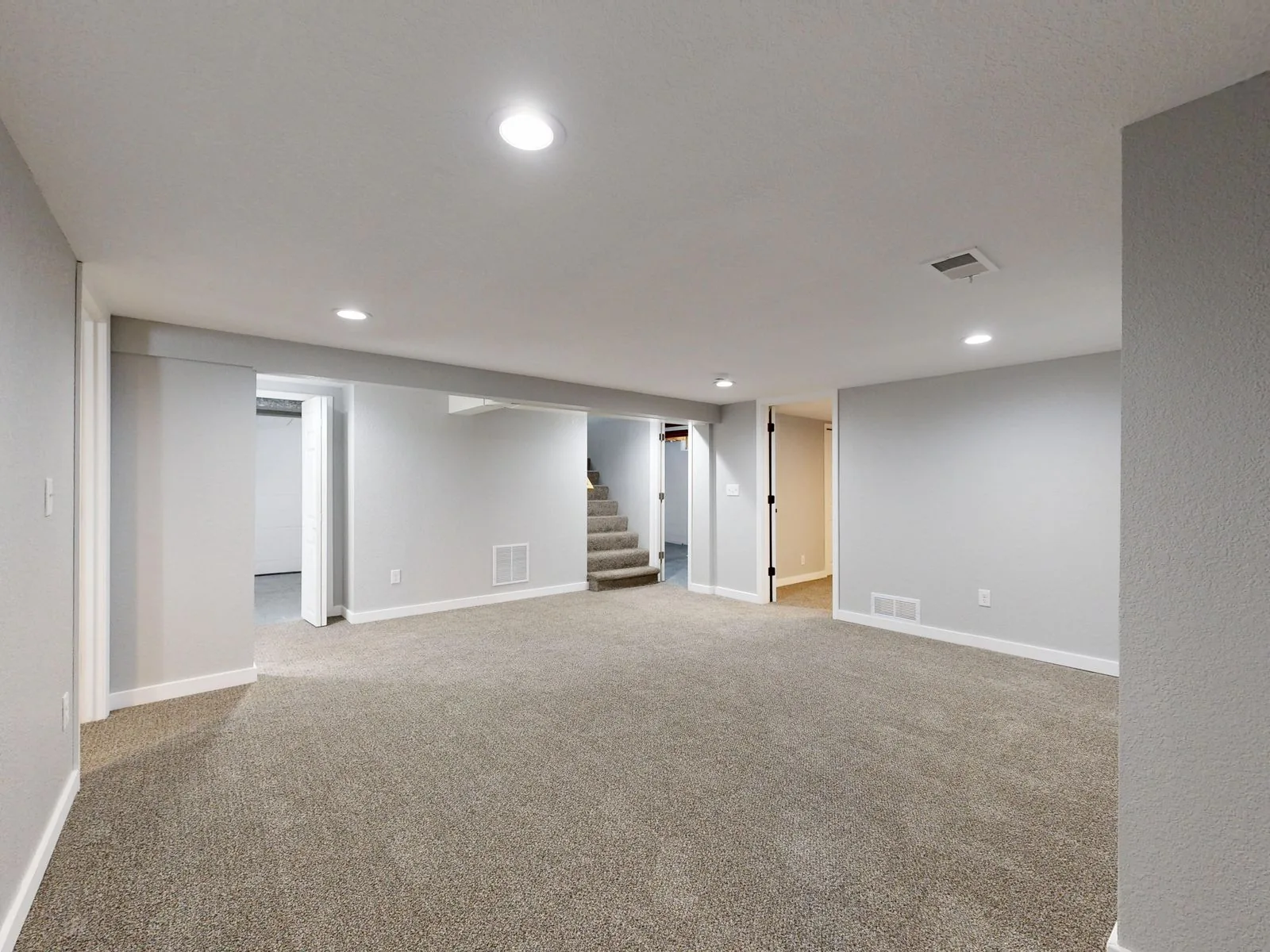 Finished basement living space with natural light