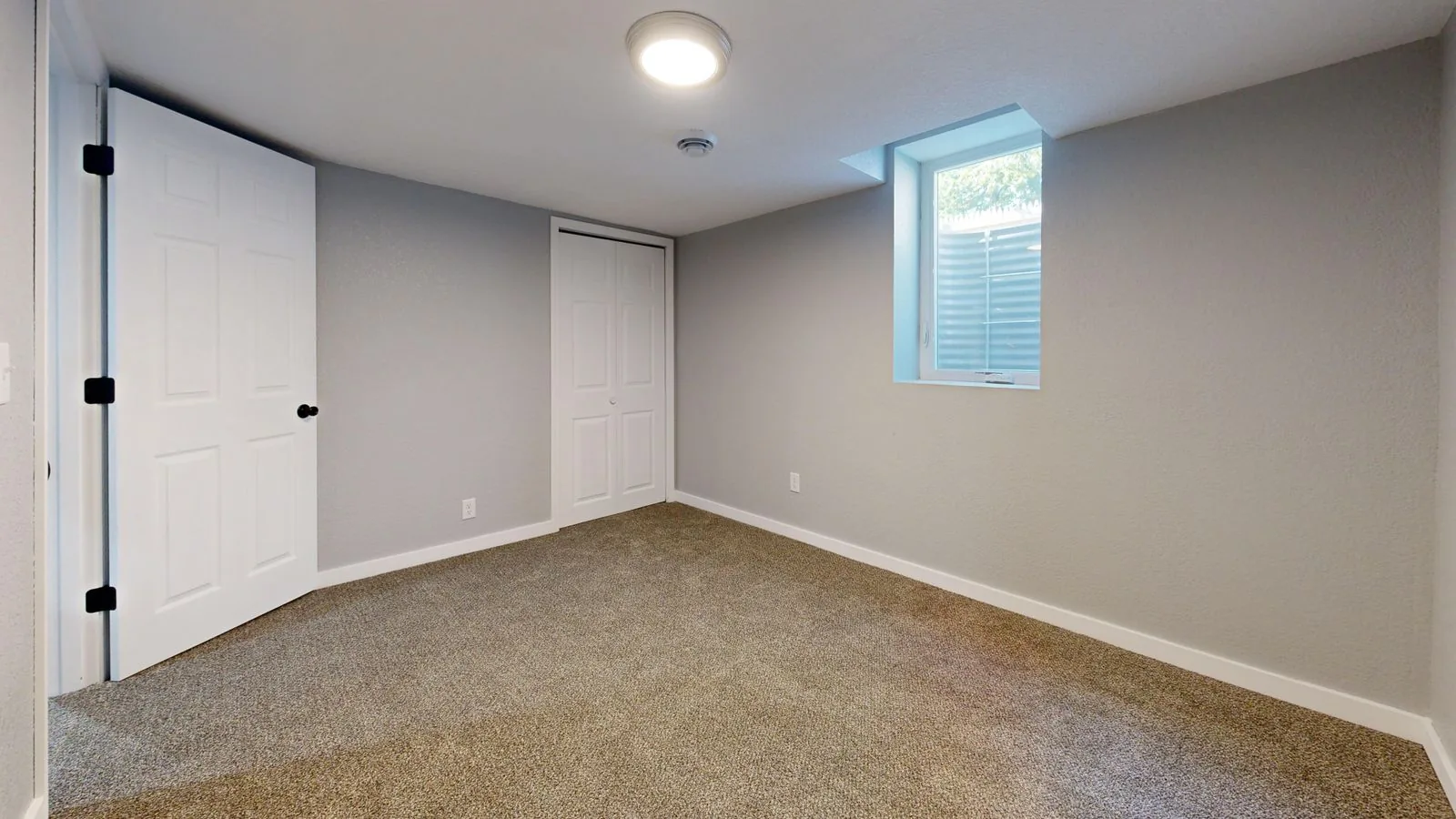 Finished basement living space with a timeless design