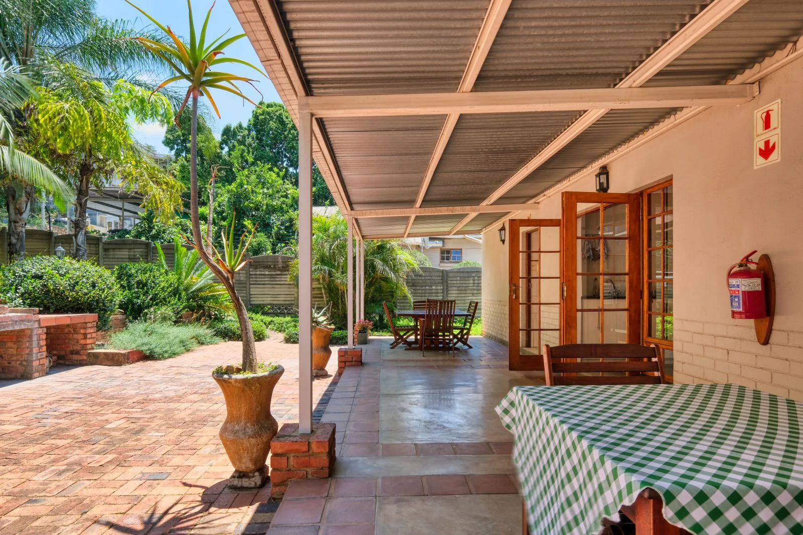 Covered patio outdoor living area with natural light