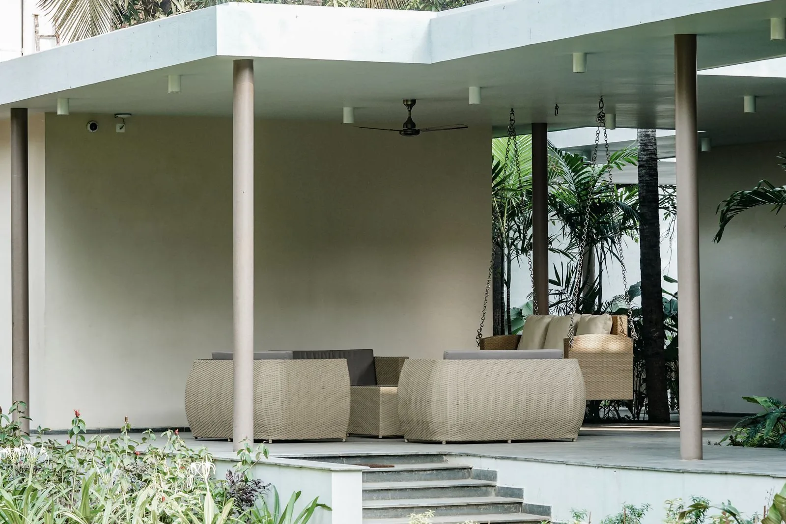 Covered patio outdoor living area with clean, modern finishes