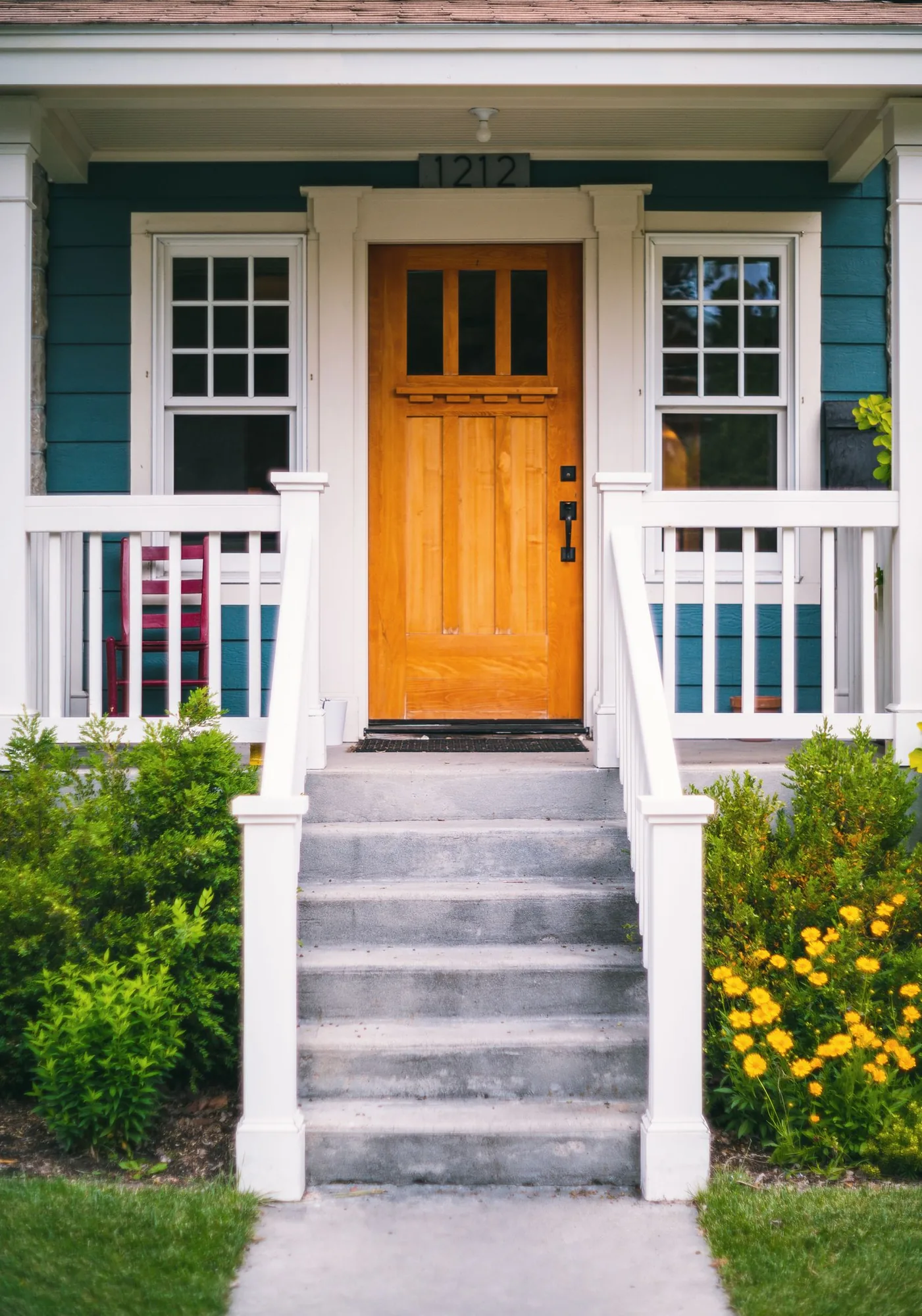 Welcoming front entryway and porch with natural light