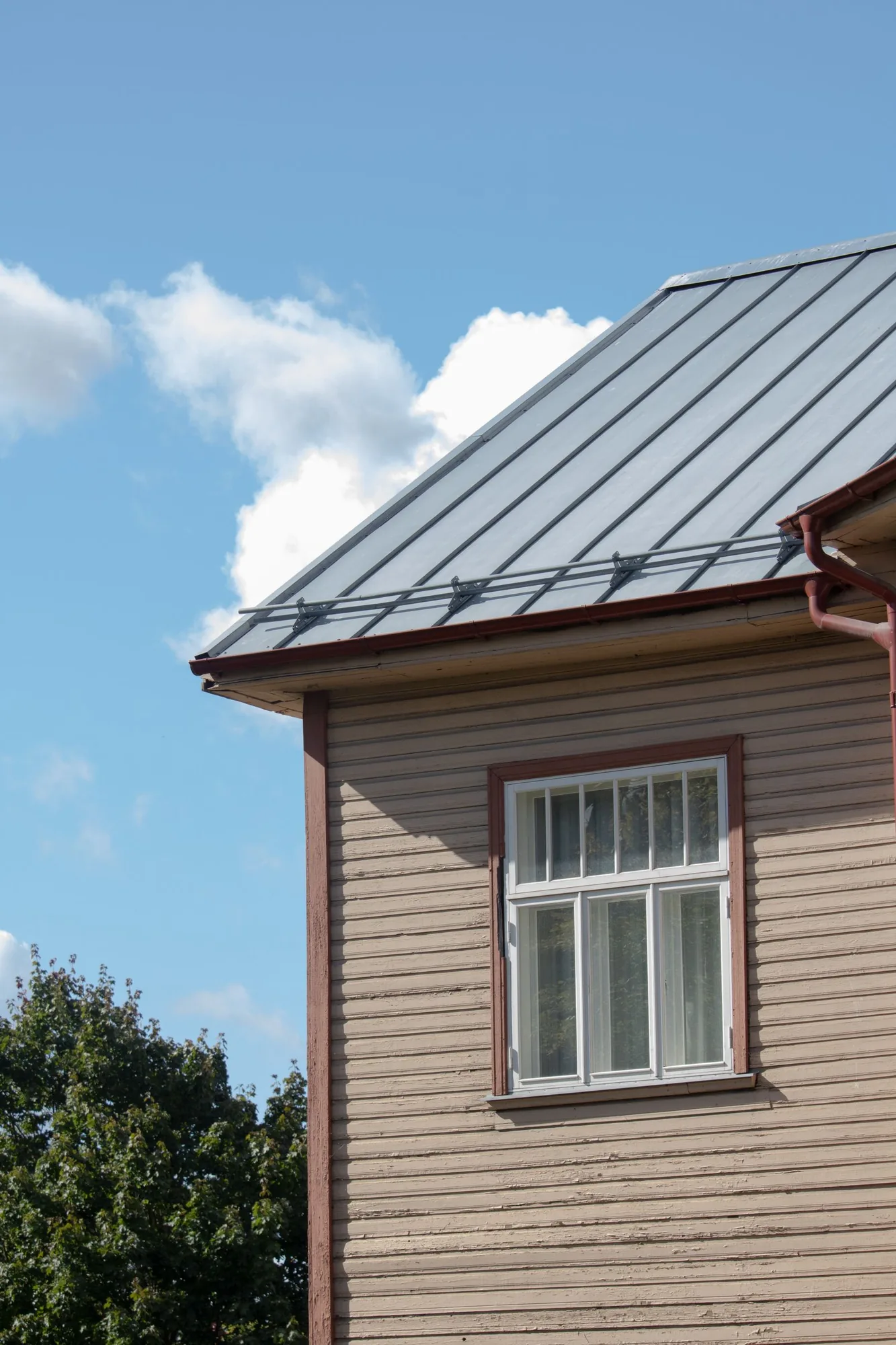 Exterior trim and fascia detail on a home with clean, modern finishes