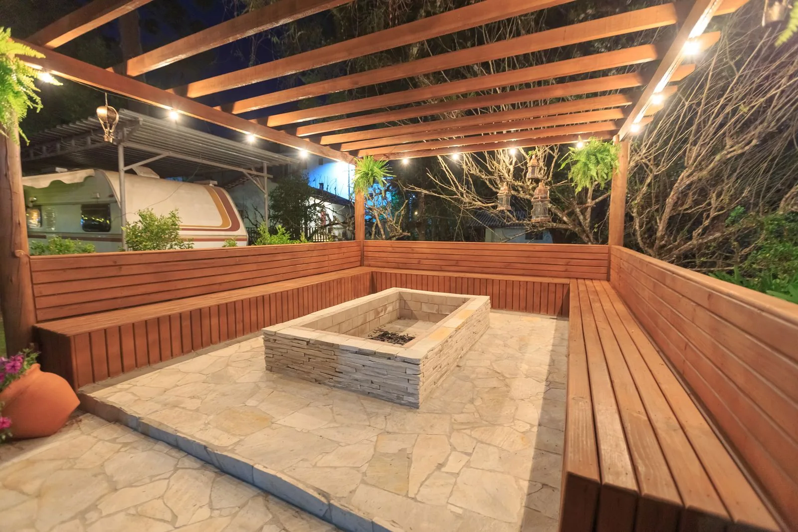 Backyard fire pit seating area with a timeless design