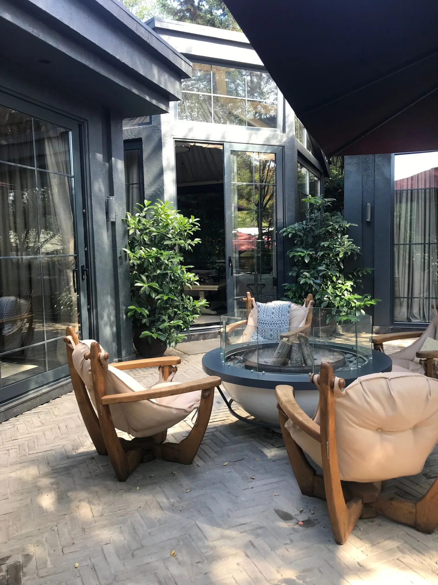 Backyard fire pit seating area by a Bellevue-area remodeler