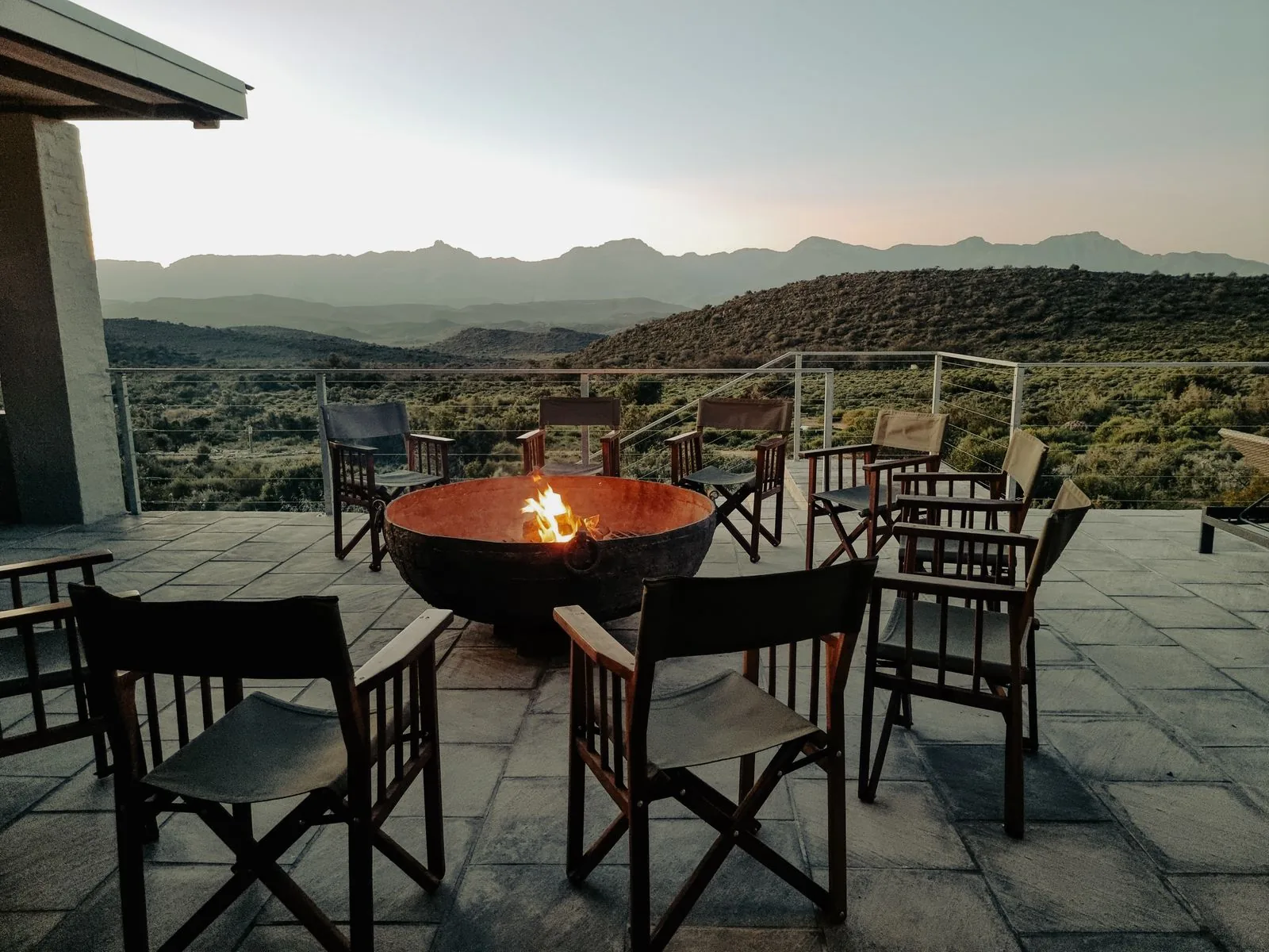 Backyard fire pit seating area with natural light