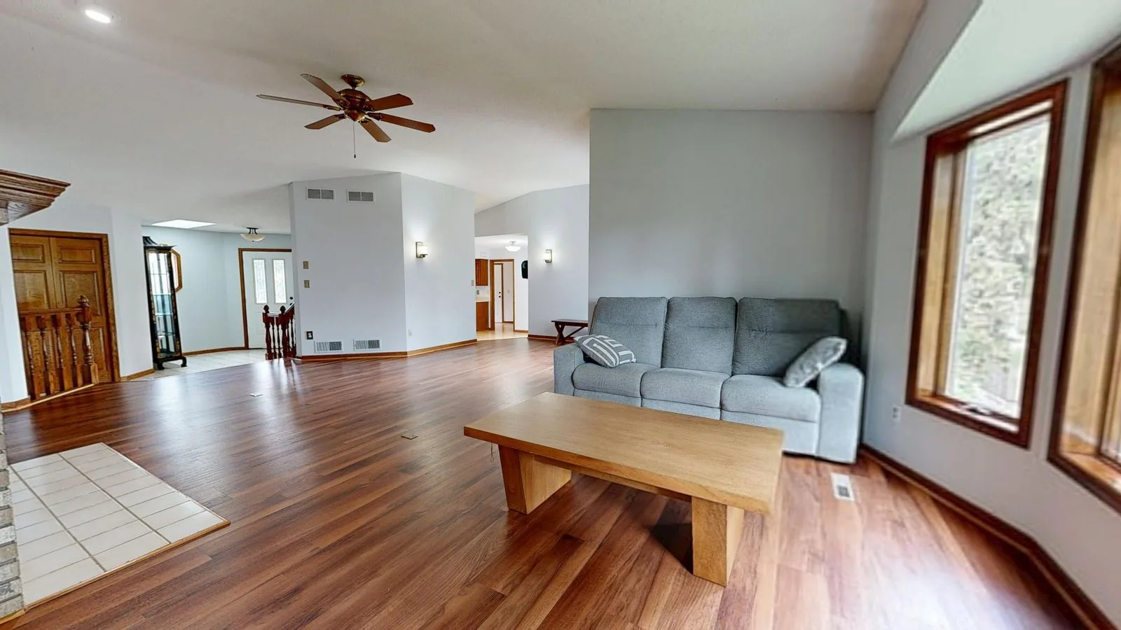 Room with newly installed hardwood flooring with clean, modern finishes
