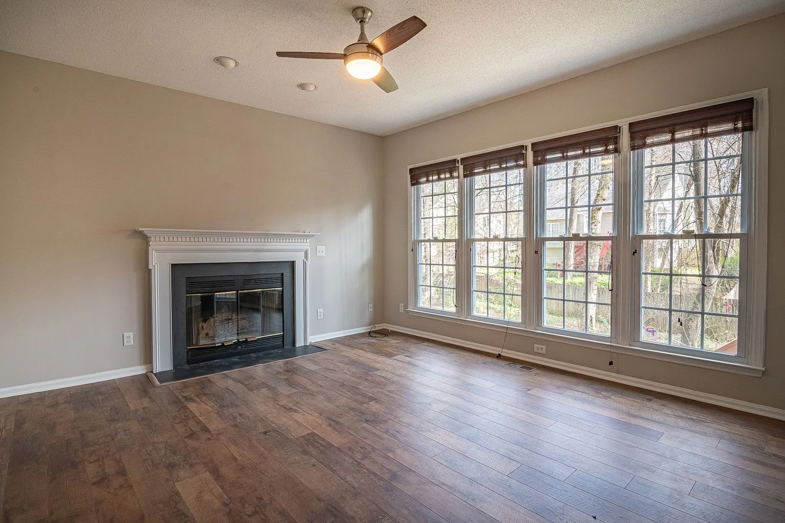 Room with newly installed hardwood flooring by a Bellevue-area remodeler