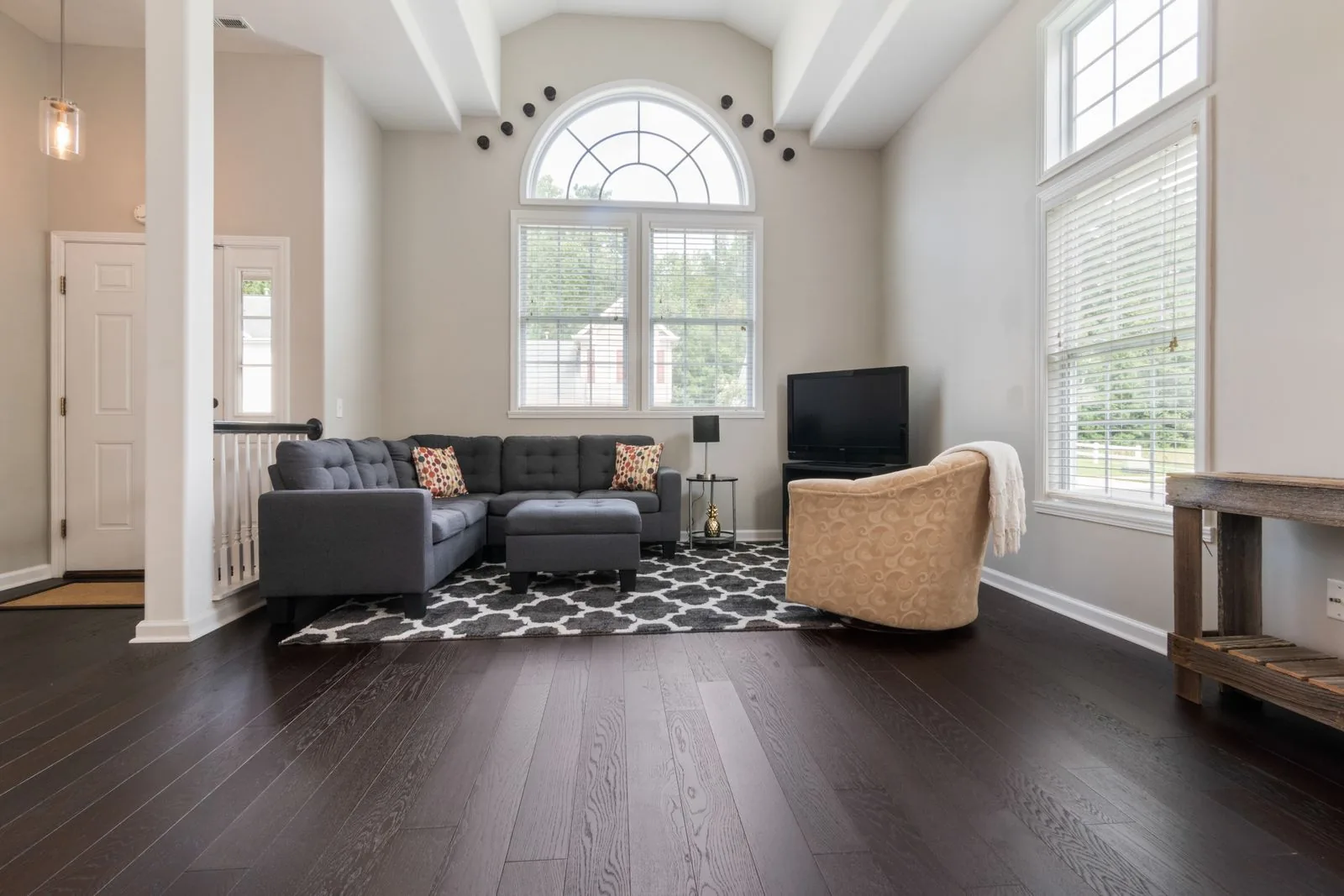 Room with newly installed hardwood flooring with a timeless design