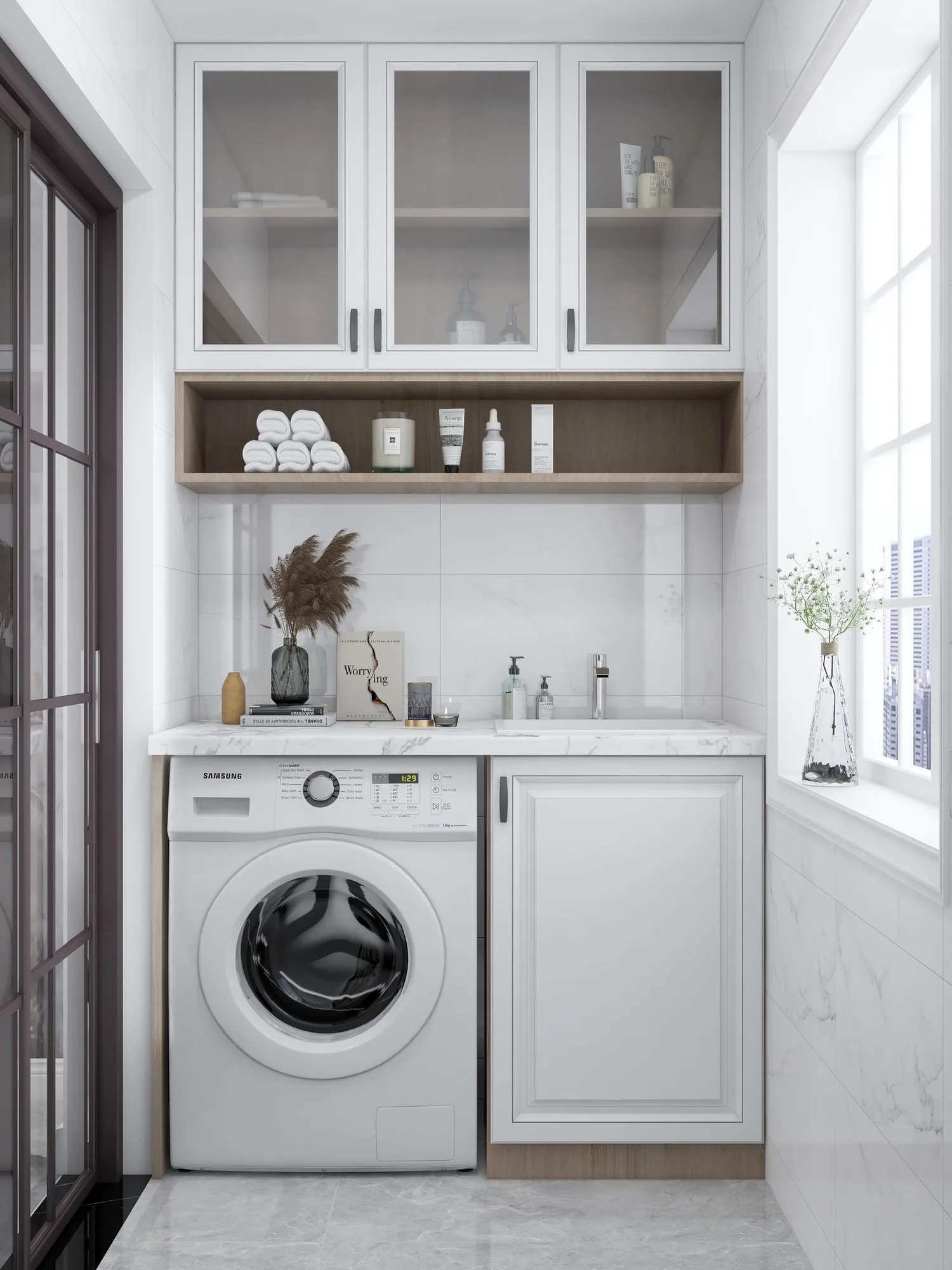 Modern remodeled laundry room with custom cabinetry