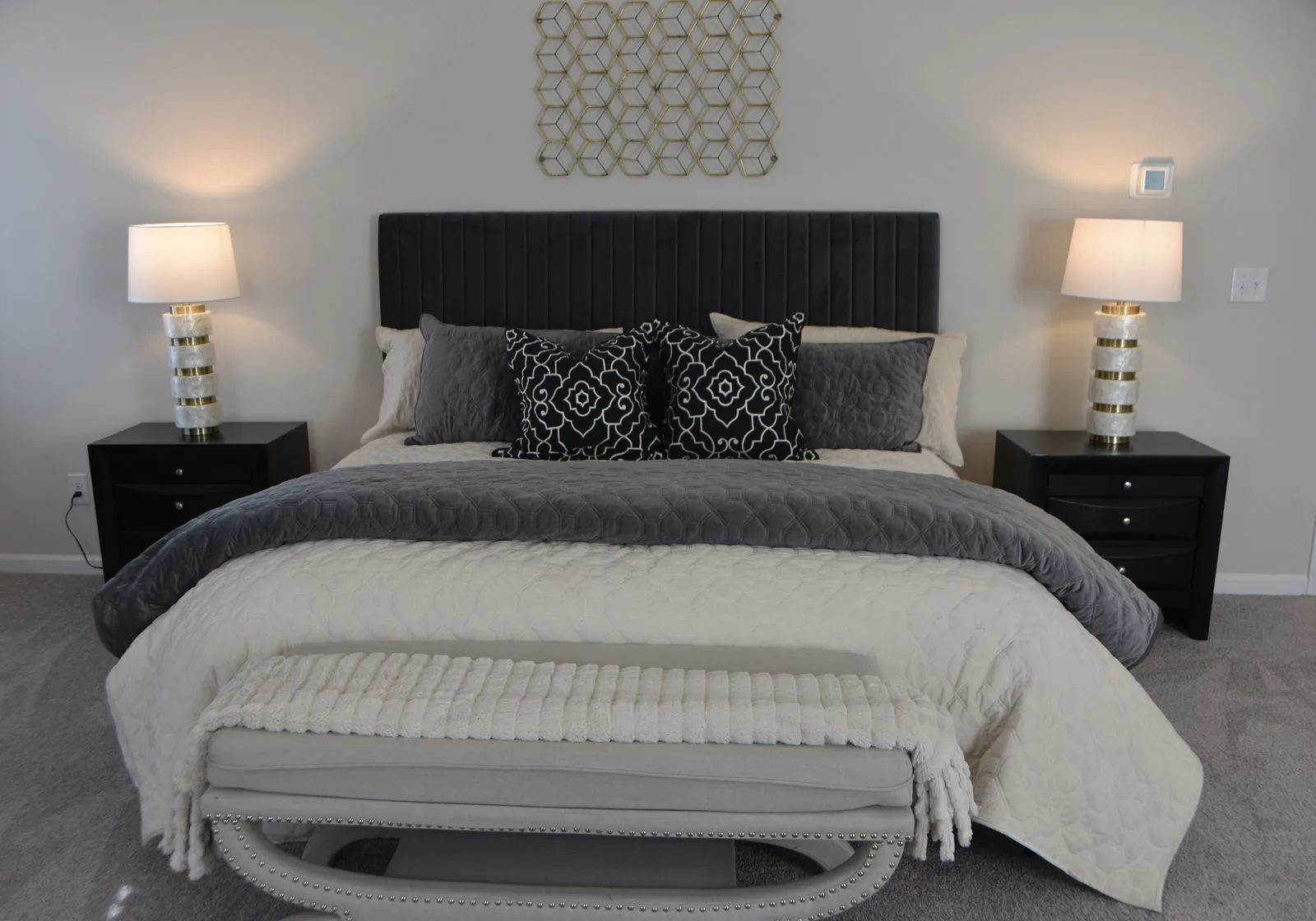 Luxury master suite bedroom with premium materials