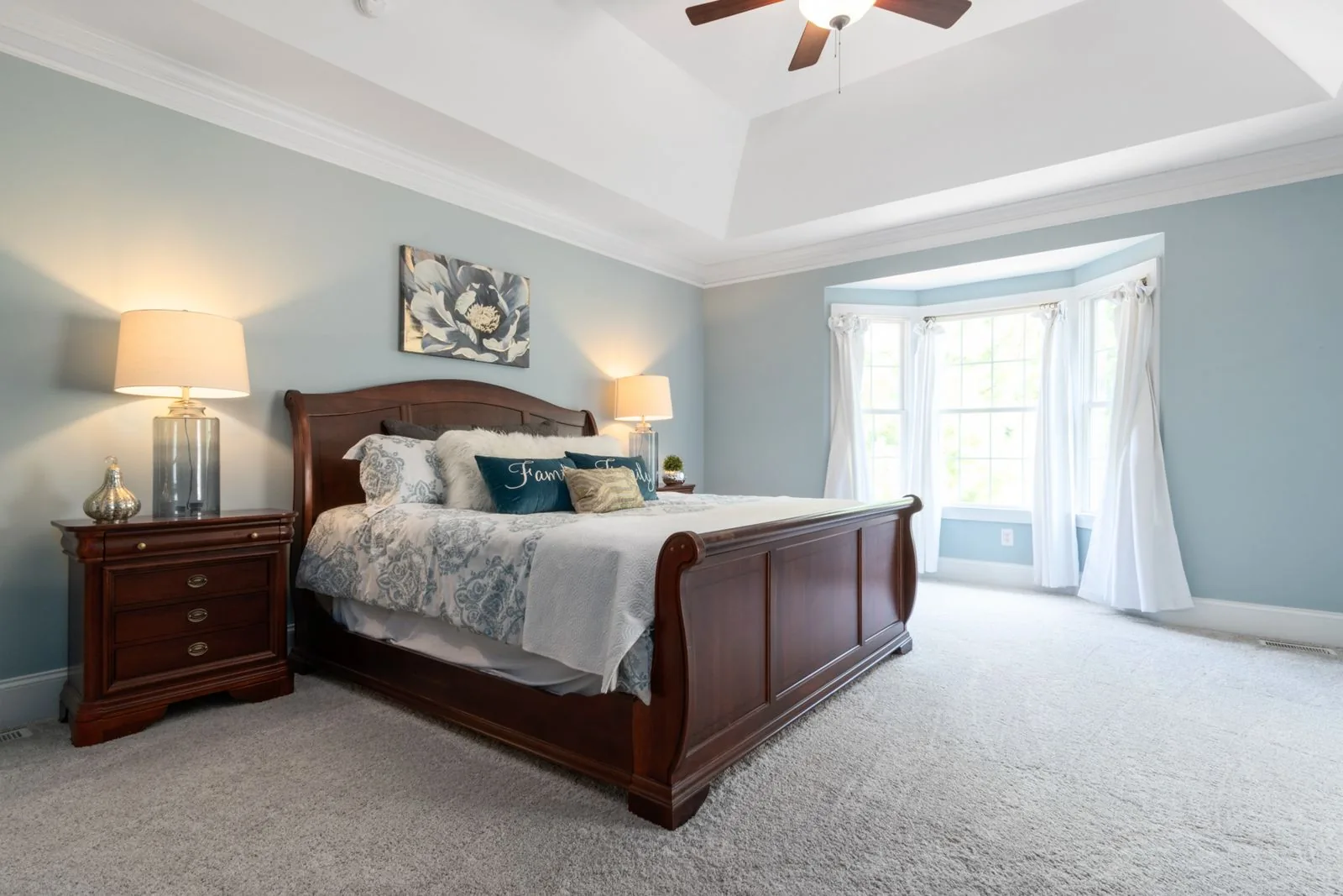 Luxury master suite bedroom with clean, modern finishes