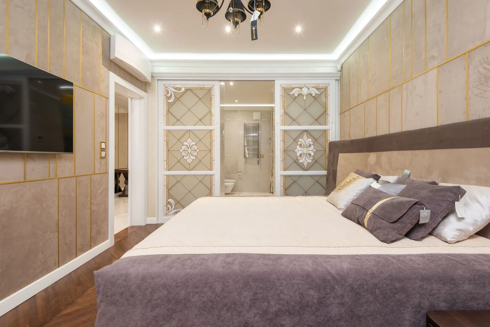 Luxury master suite bedroom after a full remodel