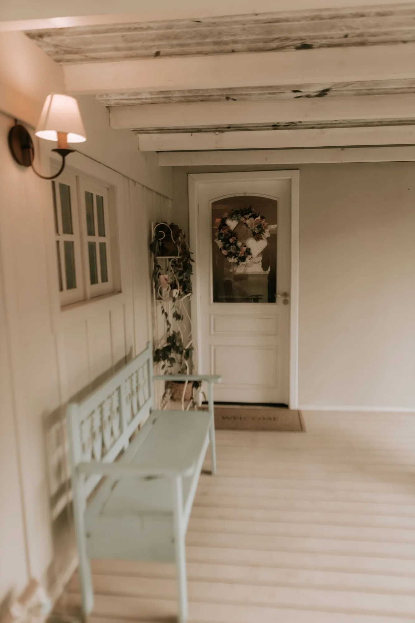 Custom mudroom with a built-in bench and lockers after a full remodel