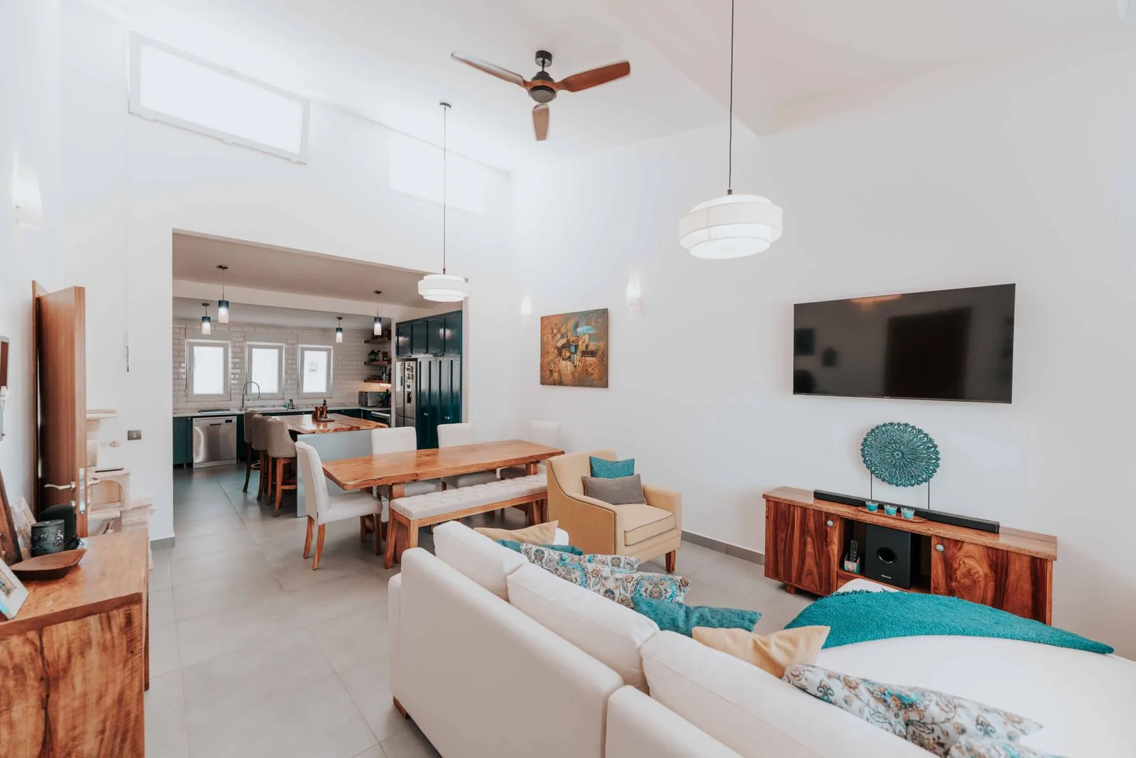Open-concept living and kitchen space with clean, modern finishes