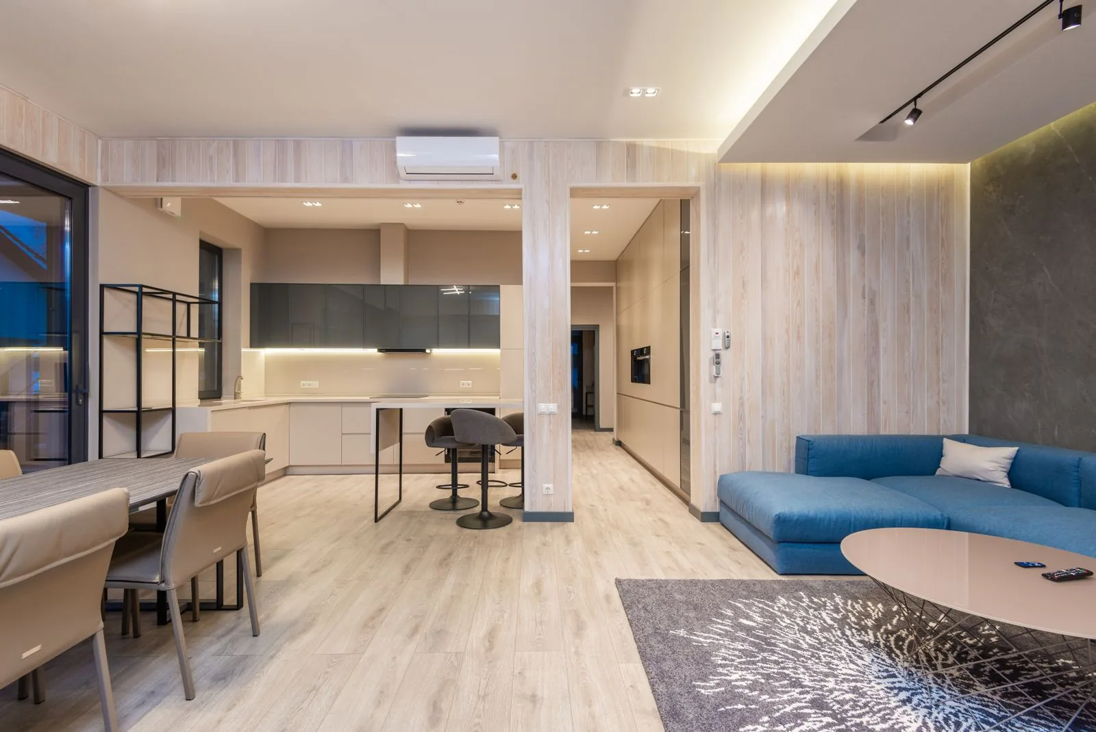 Open-concept living and kitchen space with a timeless design