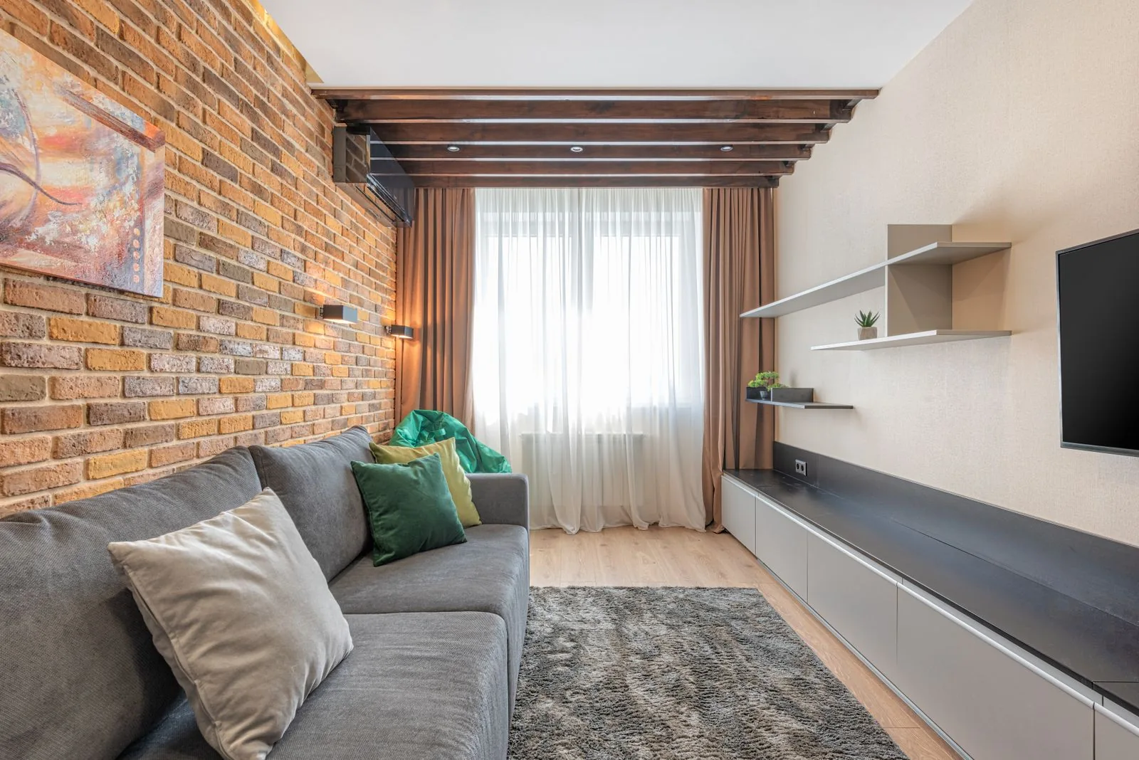 Open interior with exposed structural beams with a timeless design