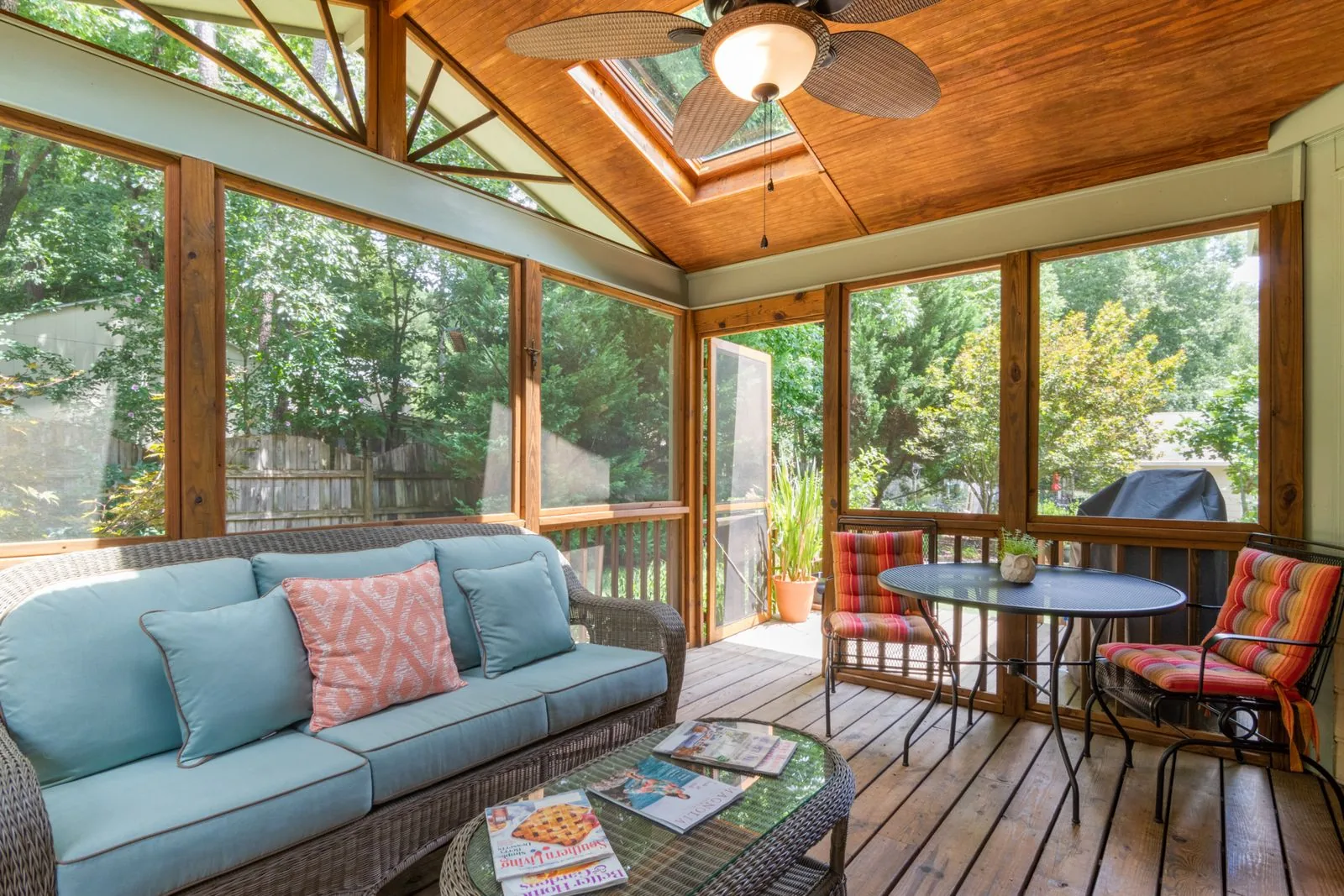 Sunroom addition with walls of glass