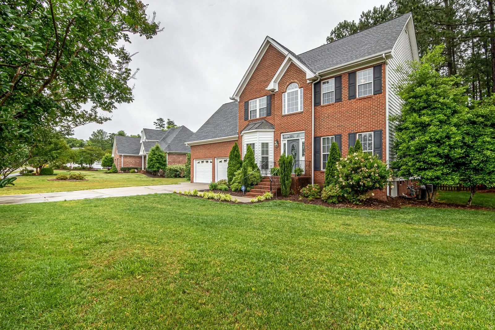 Two-story home exterior with natural light