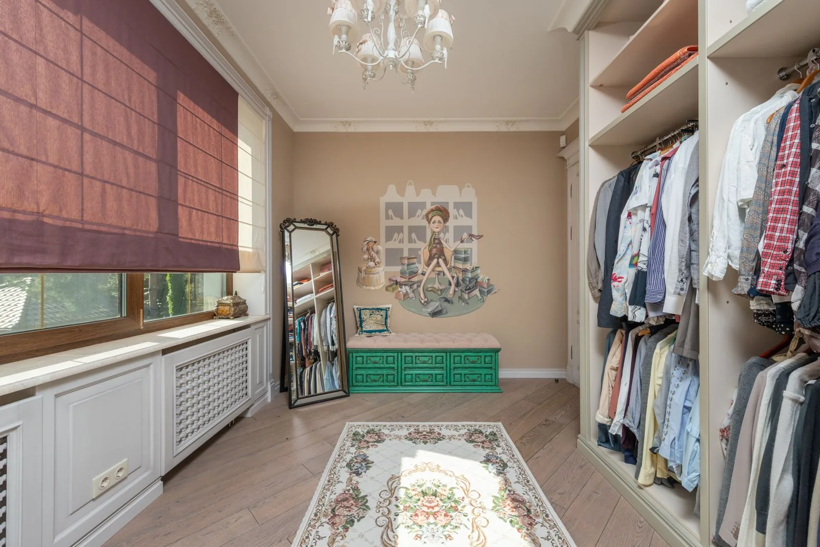Custom walk-in closet with built-in storage after a full remodel